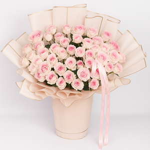 Blushing Cascade – 100 Pink Spray Roses in Designer Wrap